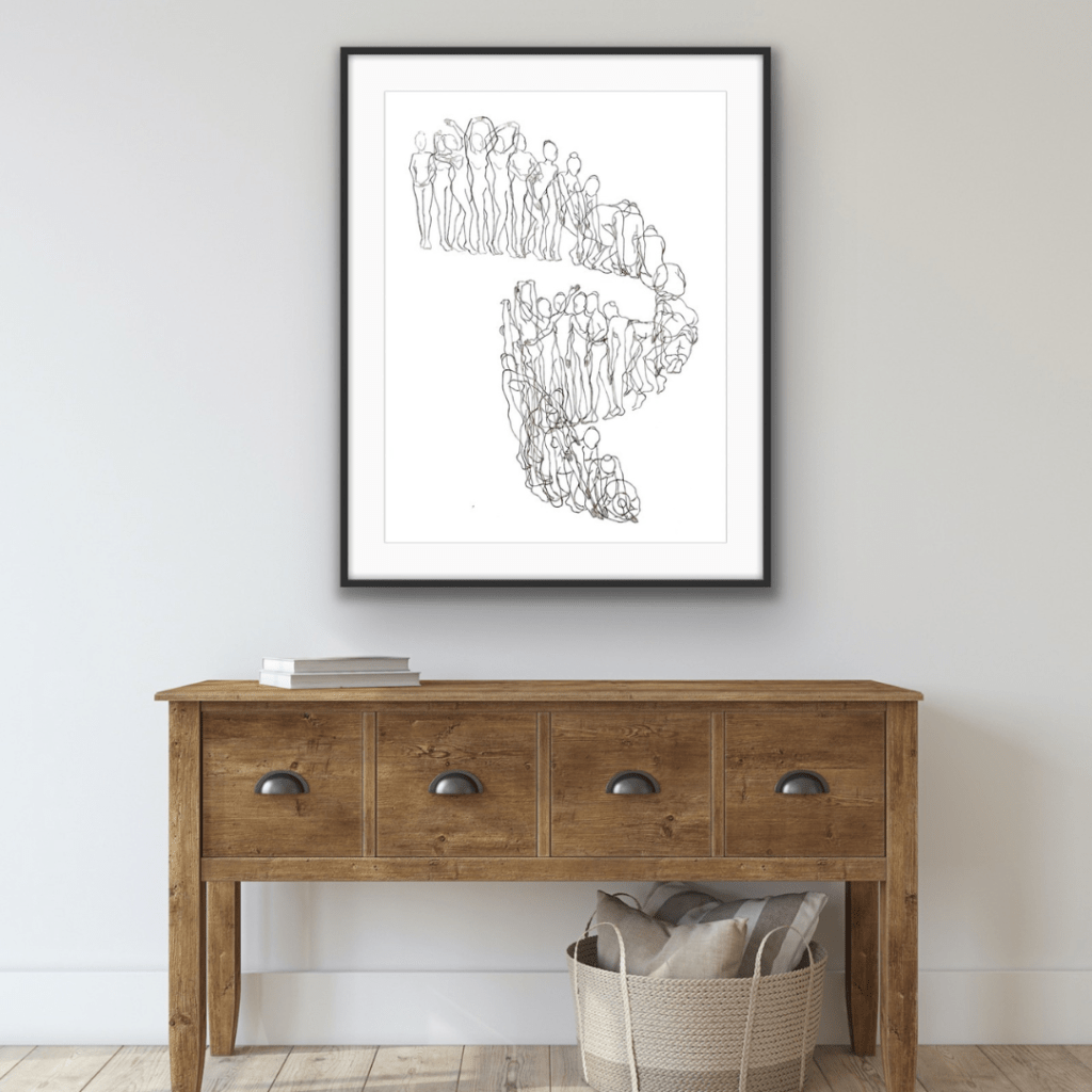 A stylish sideboard with a clean, modern design, positioned against a neutral wall. Above the sideboard, a framed line-drawing artwork depict abstract human figures, adding a minimalist and artistic touch to the space.