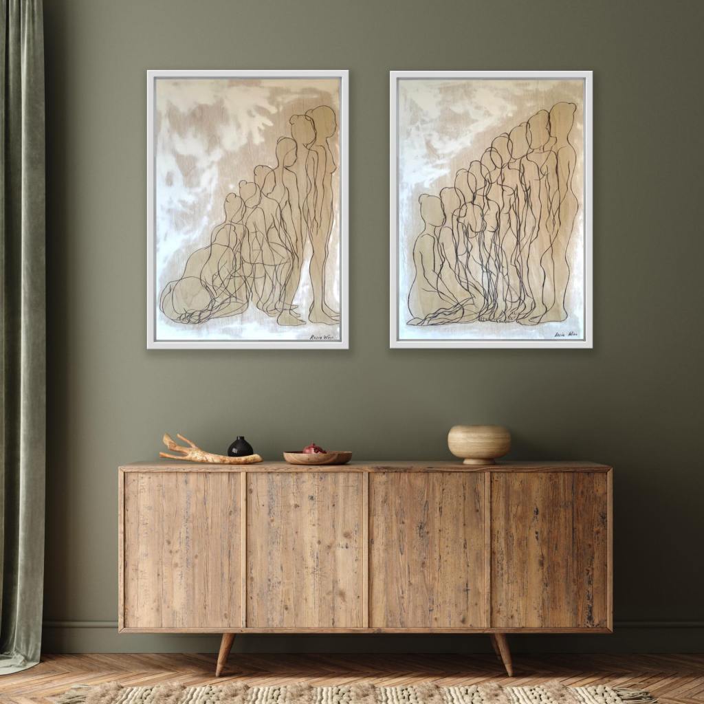 A drawing of overlapping figures hanging on wall above a desk and chair