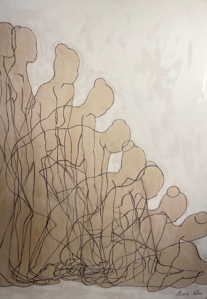 Line drawing on wood of overlapping female figures